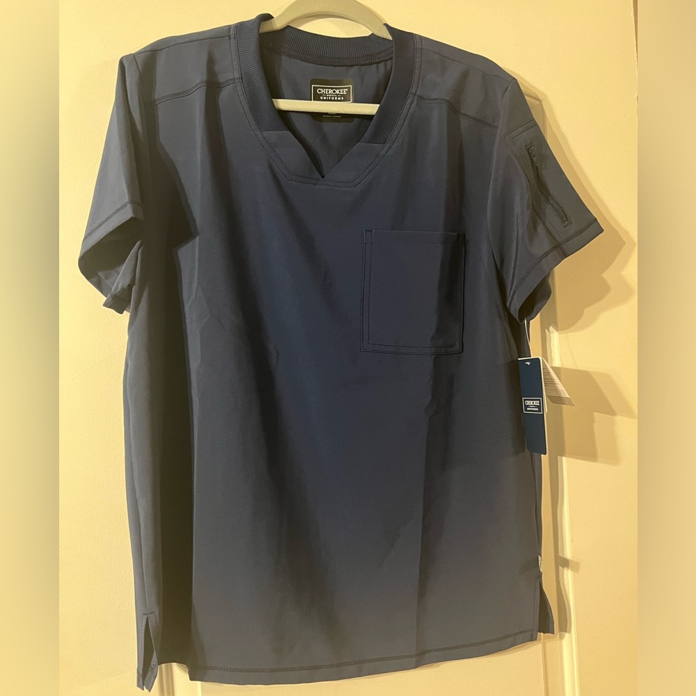 Men’s size medium Cherokee Certainty scrub top.  New with tags.